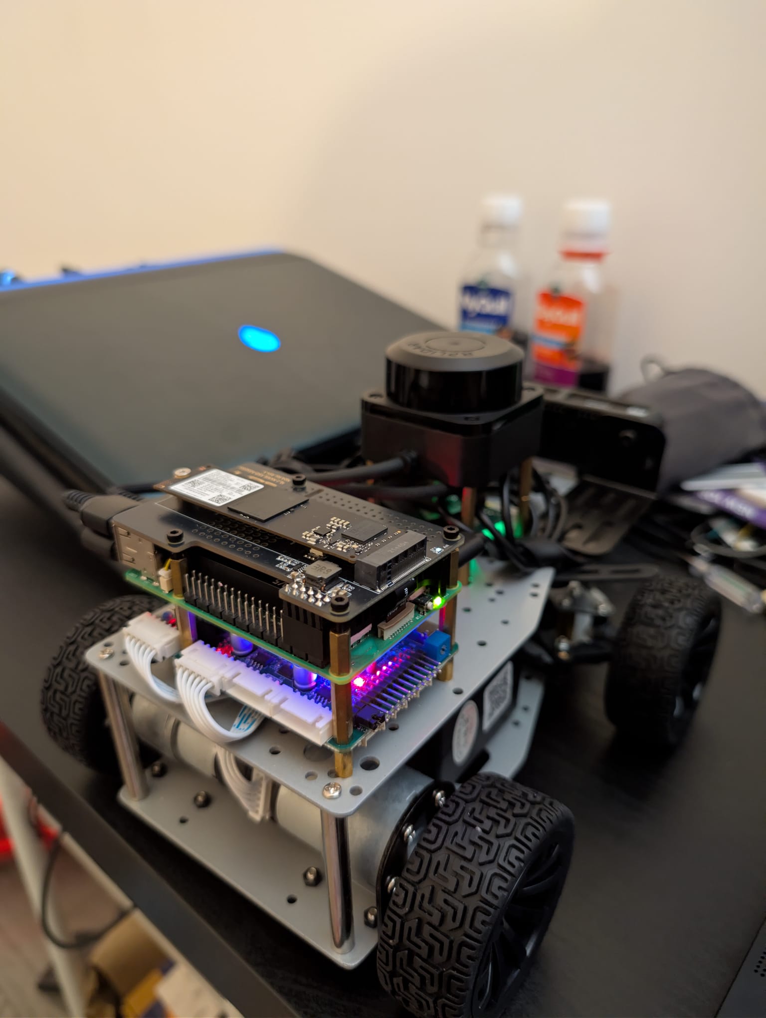 Ackermann-steering robot with onboard Raspberry Pi, Jetson compute, lidar, and camera hardware